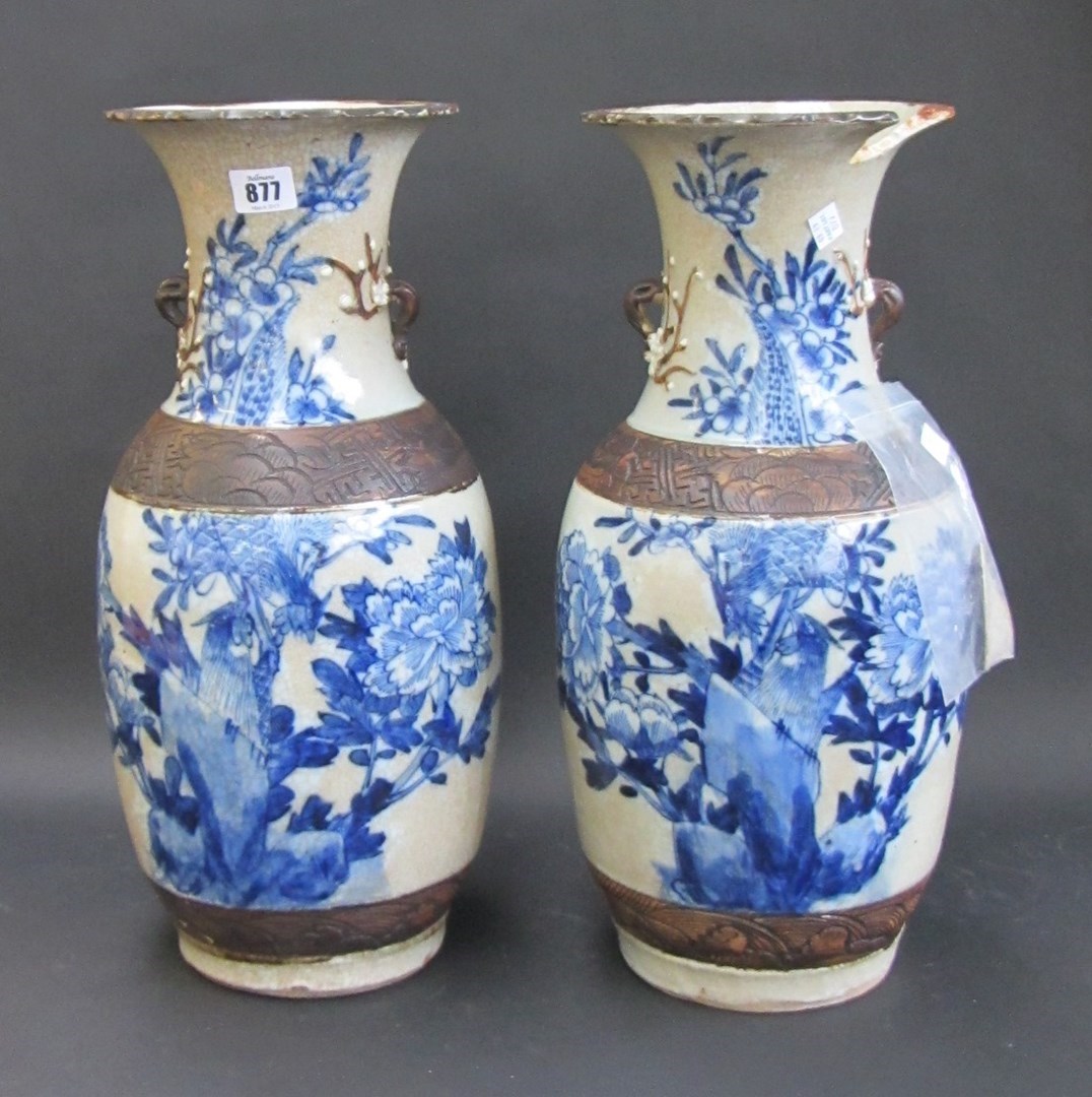 Appraisal: A pair of Chinese blue and white crackled glazed baluster