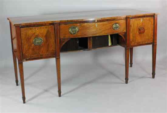 Appraisal: A George III inlaid mahogany serpentine sideboard with central drawer