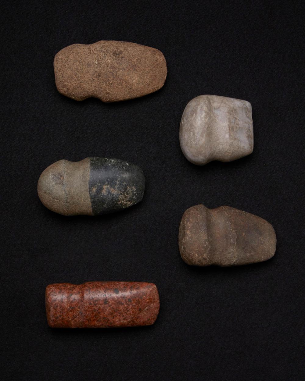 Appraisal: A collection of carved stone axes Pre-historic or later Comprising