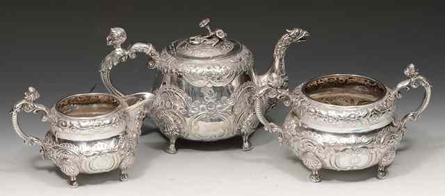 Appraisal: A GEORGE III IRISH SILVER TEAPOT with a satyr and