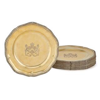 Appraisal: SET OF TWELVE GEORGE V SILVER GILT DINNER PLATES Shaped