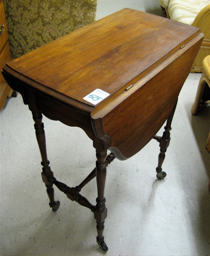 Appraisal: PETITE WALNUT DROP-LEAF TEA TABLE American th century the table's