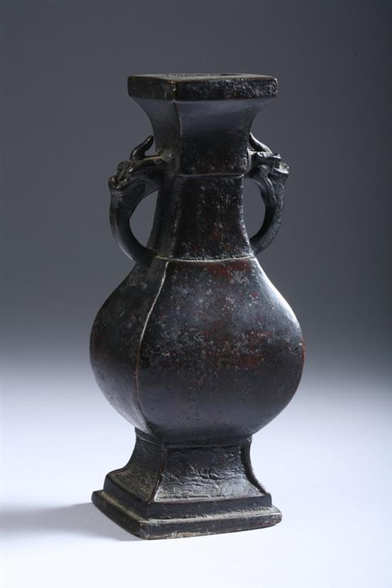 Appraisal: CHINESE BRONZE VASE Ming Dynasty Flattened ovoid-form with a flat