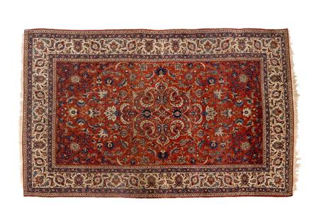 Appraisal: An Isfahan rug early th century the red field with