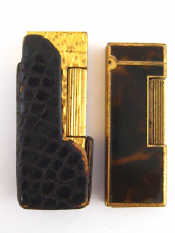 Appraisal: Two Dunhill cigarette lighters one gold plated with Dunhill crocodile