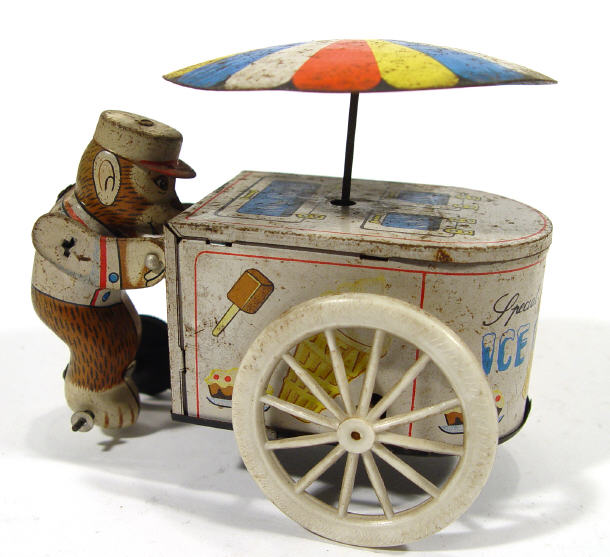 Appraisal: Japanese tinplate ice cream vending monkey with rotating umbrella cm