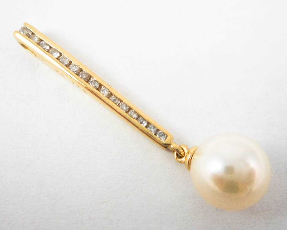 Appraisal: PEARL DIAMOND AND FOURTEEN KARAT GOLD PENDANT with a row