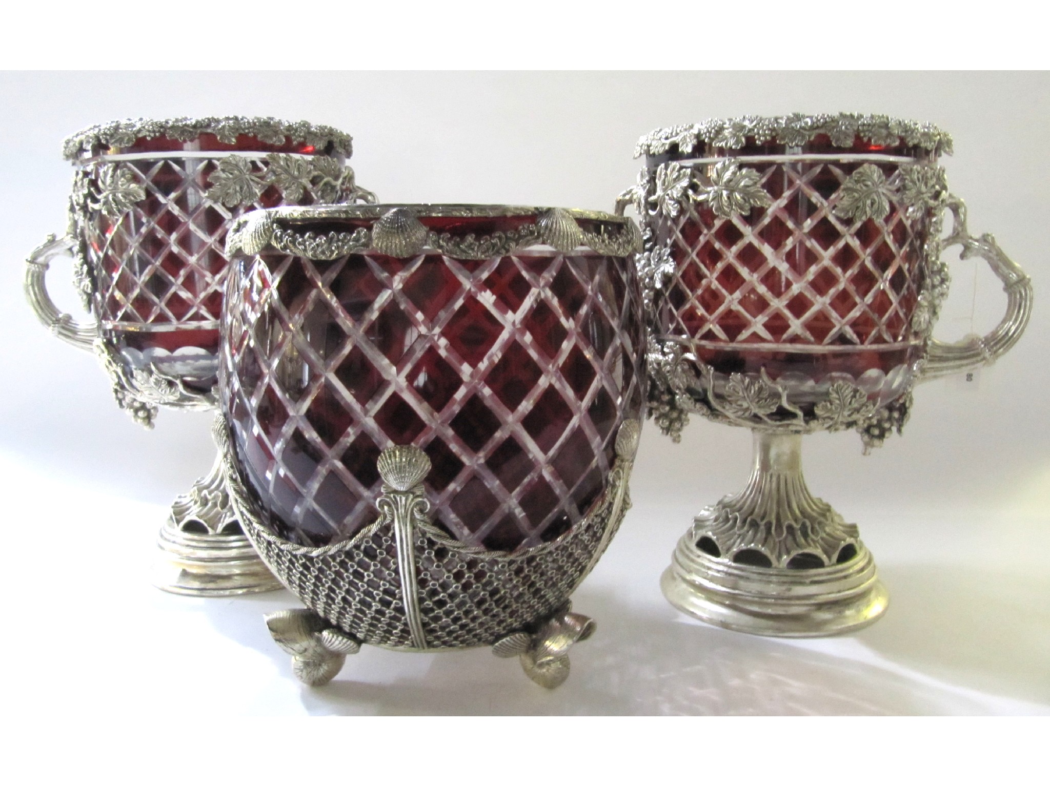 Appraisal: A pair of silver plated wine coolers with cut glass