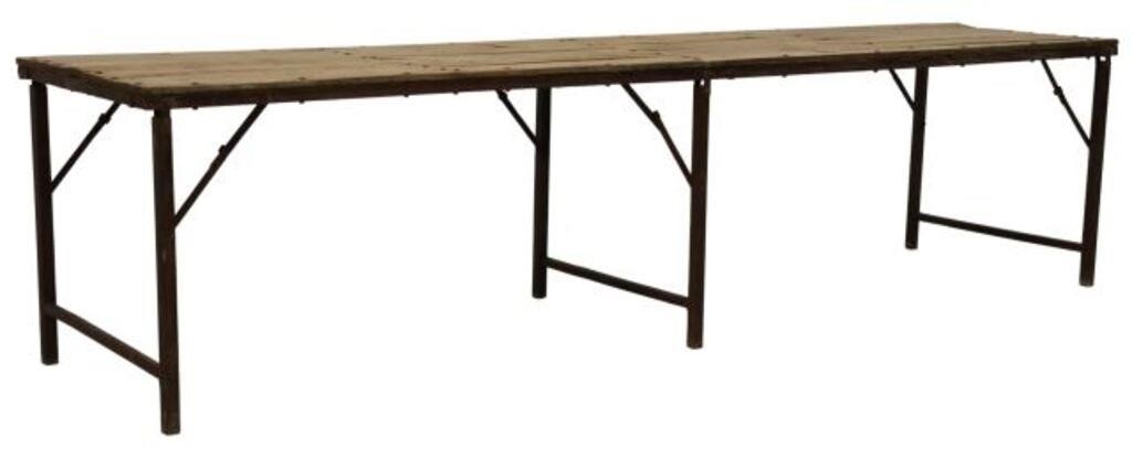 Appraisal: Large rustic dining table th c having rectangular plank top