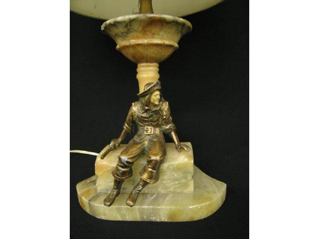 Appraisal: Deco Lamp seated pirate with gun carved alabaster tall body