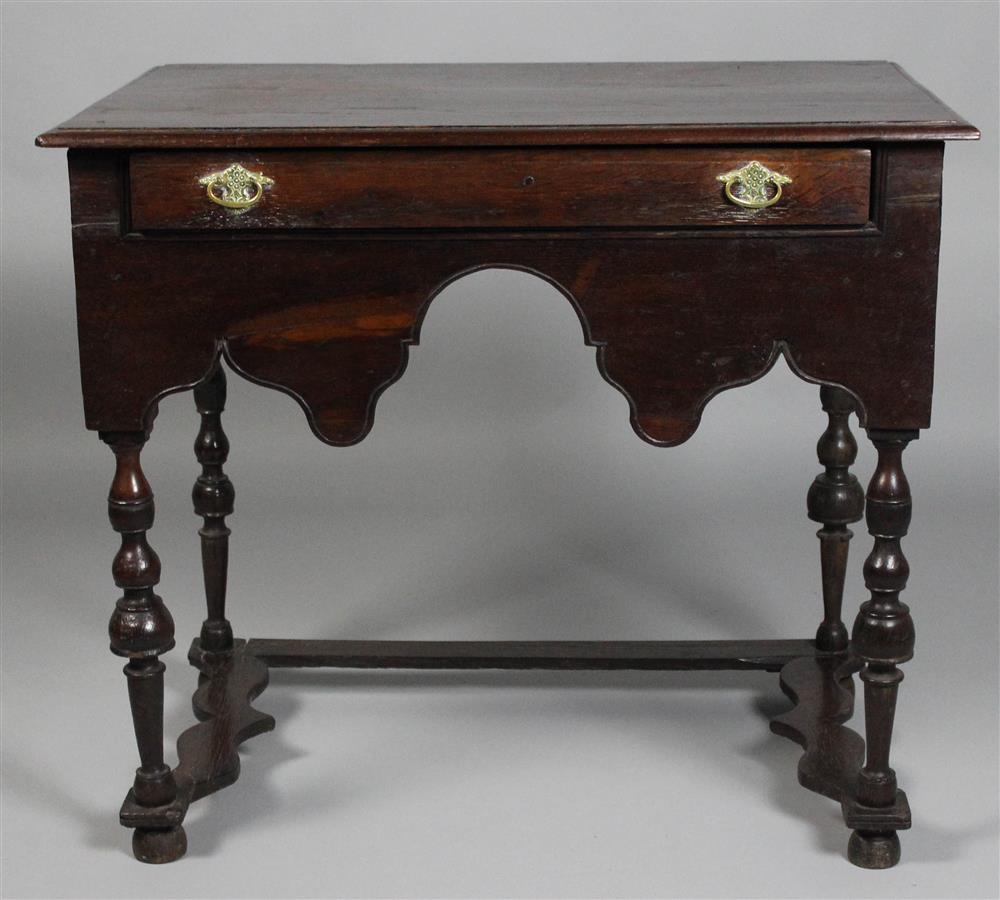 Appraisal: ENGLISH WILLIAM AND MARY OAK LOWBOY the rectangular top with