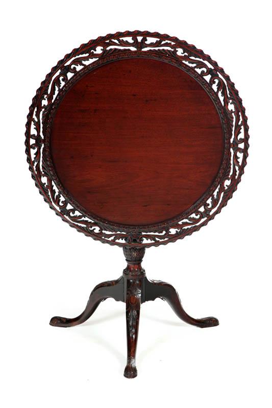 Appraisal: TILT-TOP TABLE Probably England th century mahogany Pierce carved foliate