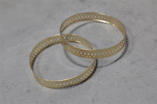 Appraisal: PAIR OF GOLD BANGLES Both reticulated with illegible hallmarks on