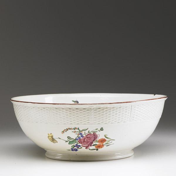 Appraisal: LUDWIGSBERG Punchbowl with basket-weave rim and floral design ca -