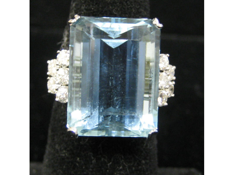 Appraisal: AQUAMARINE AND DIAMOND RING k white gold ring centering one