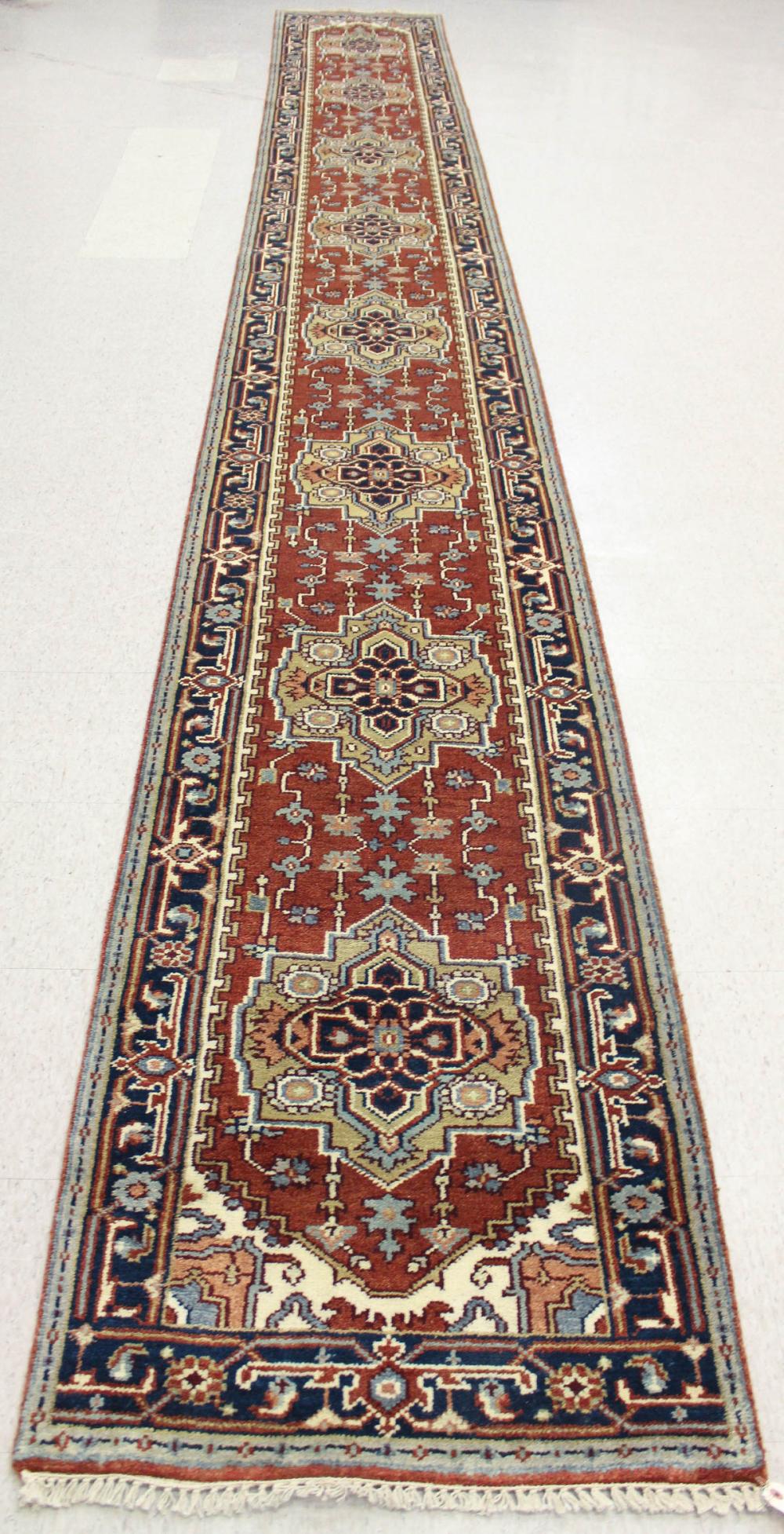 Appraisal: HAND KNOTTED ORIENTAL RUNNER Persian Serab design featuring eight medallions