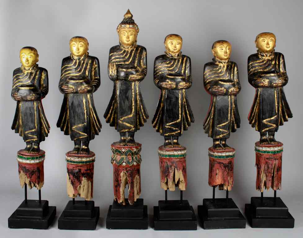 Appraisal: SIX THAI CARVED AND PAINTED WOOD FIGURES Of Buddha with