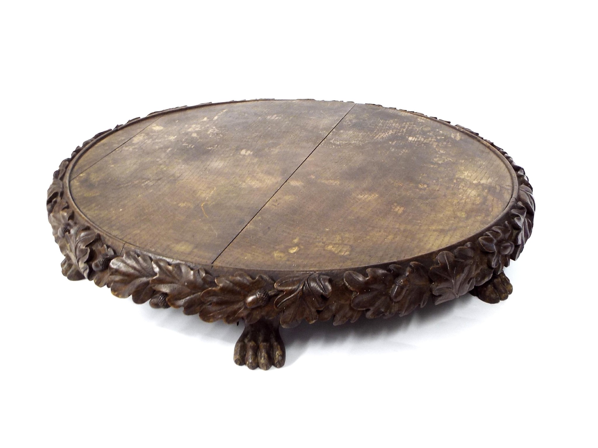 Appraisal: Large Black Forest oak Lazy Susan with carved oak leaf