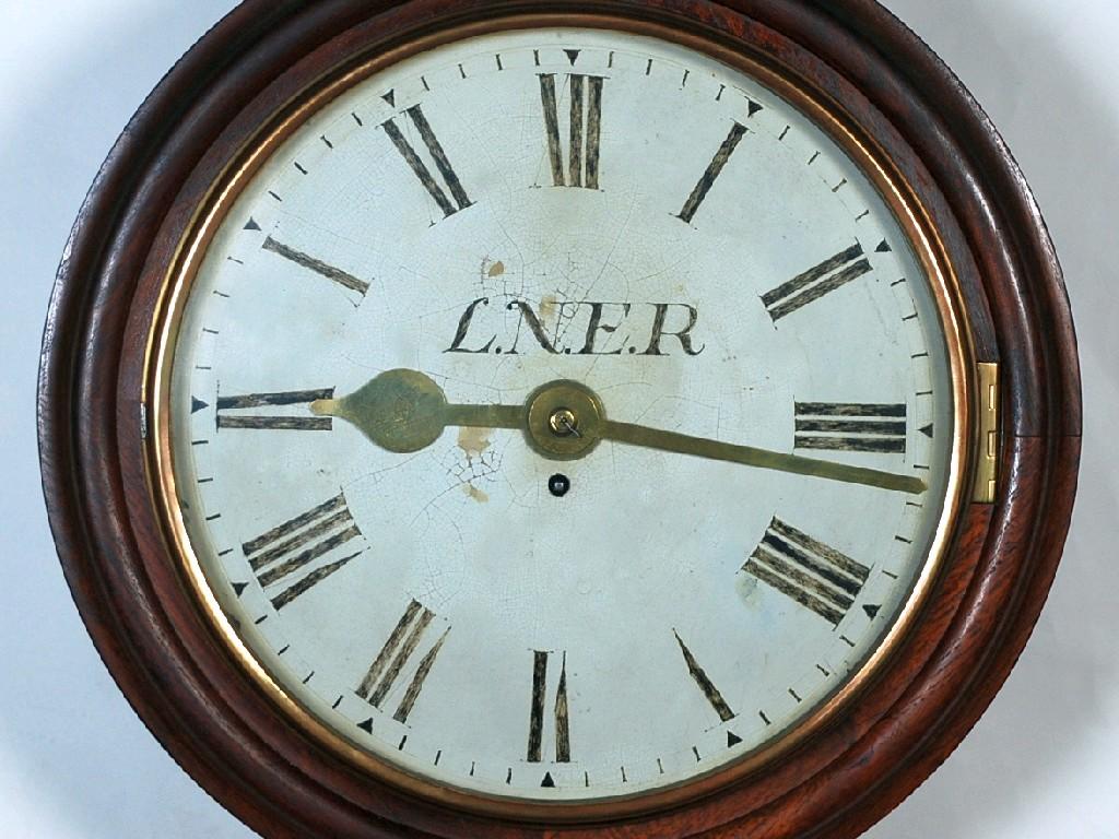 Appraisal: OAK RAILWAY WALL CLOCK painted Roman dial marked L N