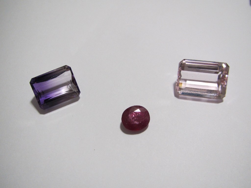 Appraisal: An oval cut ruby ct an emerald cut pink kunzite