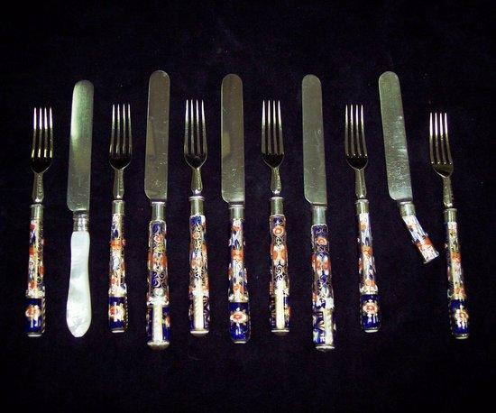 Appraisal: A part set of dessert knives and forks with Crown