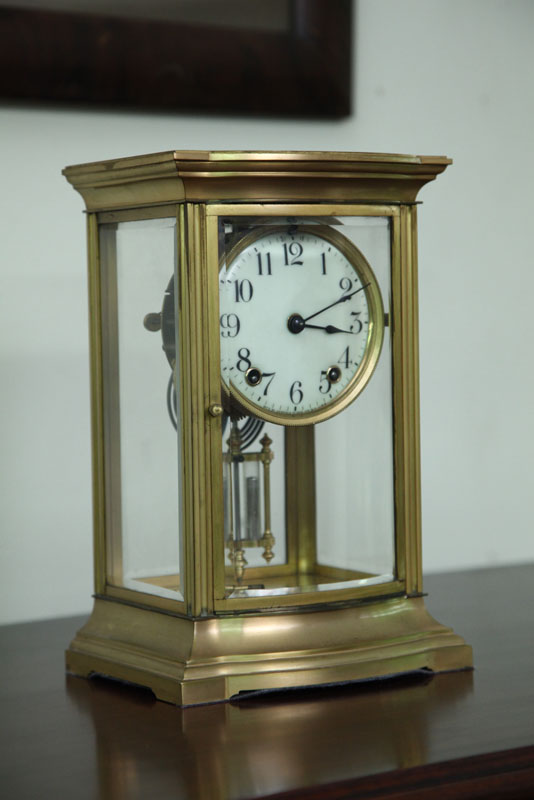 Appraisal: ANNIVERSARY CLOCK Brass case with beveled glass sides and doors