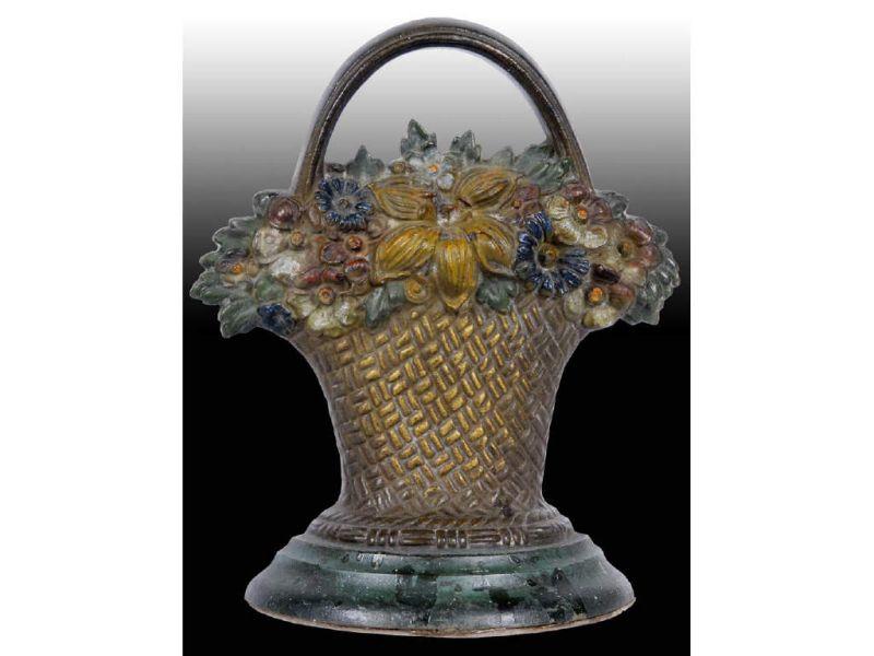 Appraisal: Flowers in Basket B H Cast Iron Doorstop Description -