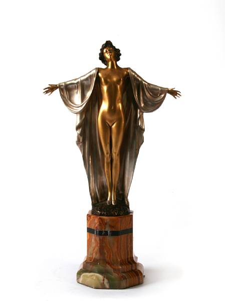 Appraisal: An Art Deco style bronze and silvered-bronze figure of a