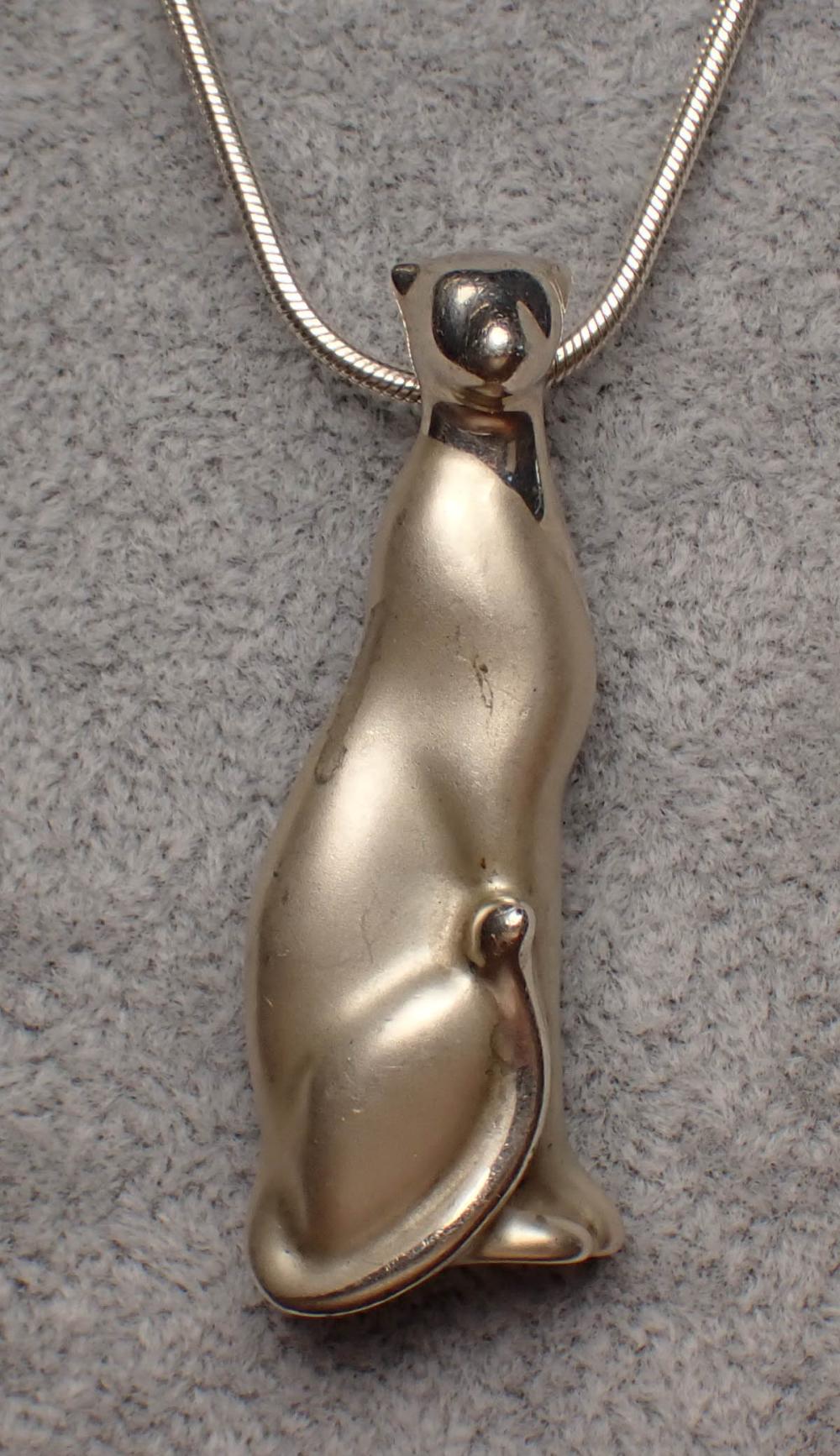 Appraisal: LOET VANDERVEEN PENDANT PIN WITH SNAKE CHAIN with a Italian