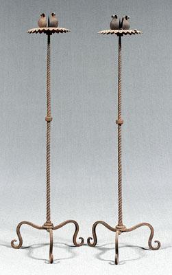 Appraisal: Pair wrought iron torch res each with pierced flower form