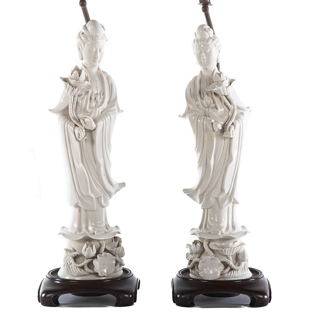 Appraisal: Pair Chinese Blanc-de-Chine Quan Yin Lamps th century figure holding