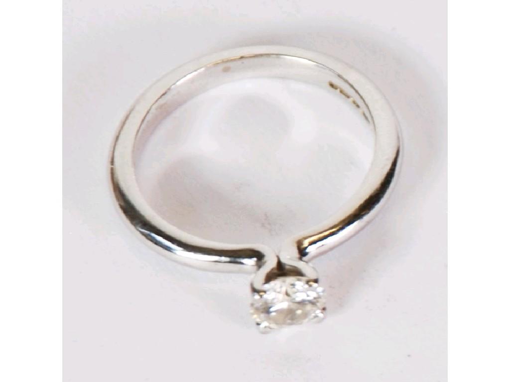 Appraisal: CT WHITE GOLD RING CLAW SET WITH A SOLITAIRE DIAMOND