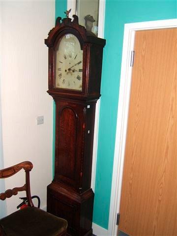 Appraisal: An early th Century oak eight day long case clock