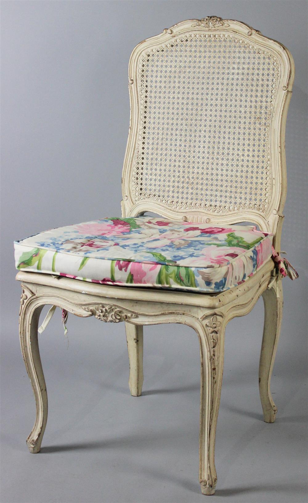 Appraisal: WHITE PAINTED LOUIS XV STYLE CARVED SIDE CHAIR with floral