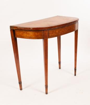 Appraisal: A George III satinwood banded card table on square tapering