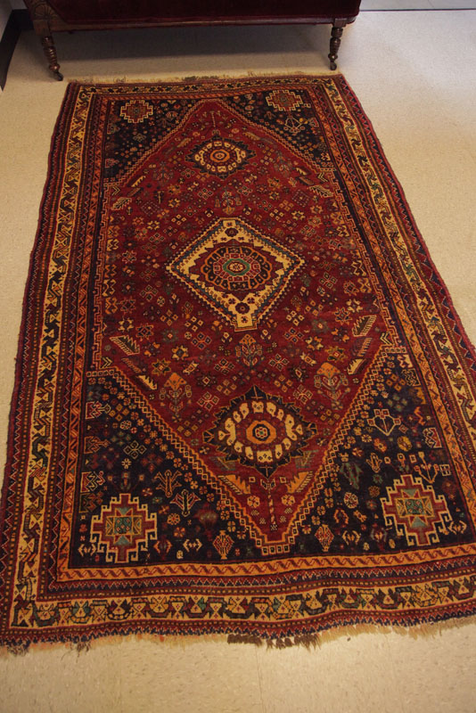 Appraisal: ORIENTAL STYLE RUG Red ground having multiple borders and central