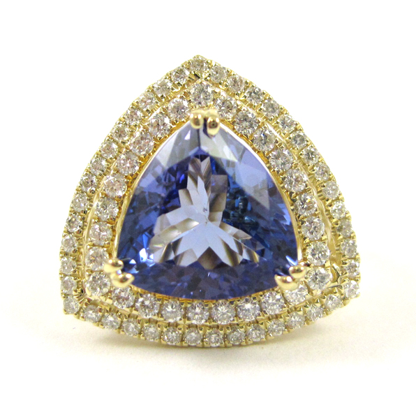 Appraisal: TANZANITE DIAMOND AND FOURTEEN KARAT GOLD RING with two rows