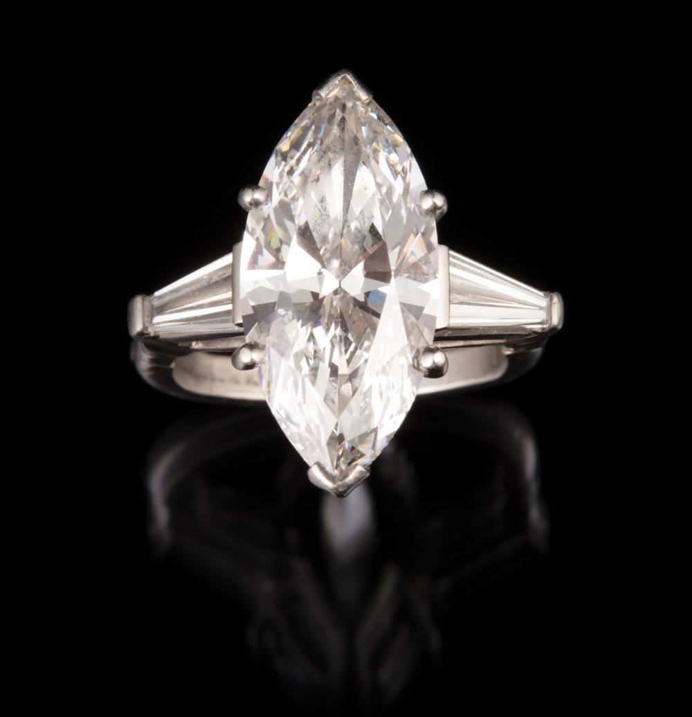 Appraisal: Exceptional Platinum and Diamond Ring center prong and bezel set