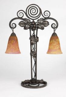 Appraisal: An Art Deco glass wrought iron table lamp The base