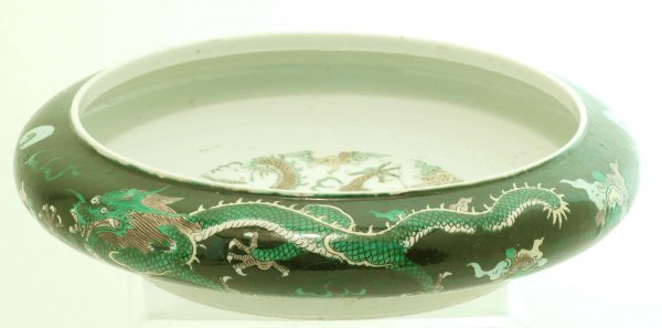 Appraisal: A Chinese enamel decorated ceramic bulb bowl Exterior with dragons