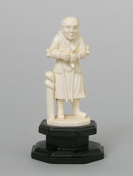 Appraisal: A Continental Carved Ivory Figurine of a Monk A Continental