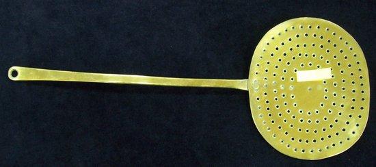 Appraisal: An oval pierced brass creamer with handle cm long