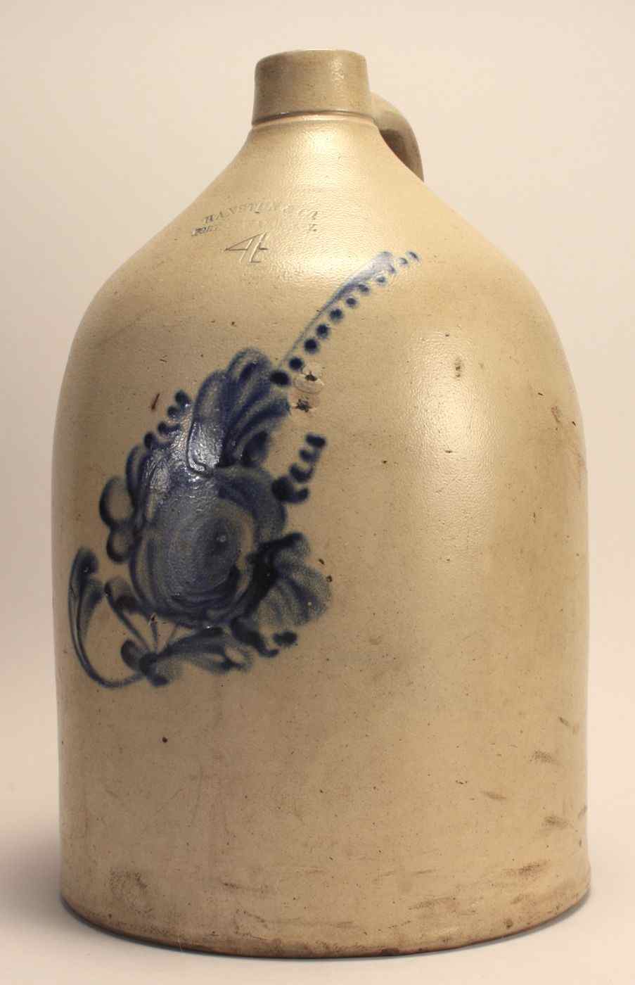 Appraisal: AMERICAN FOUR-GALLON STONEWARE JUG th CenturyWith cobalt blue floral decoration