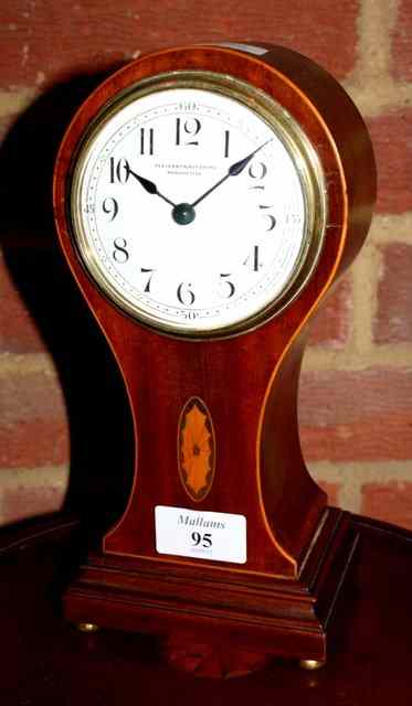 Appraisal: AN EDWARDIAN MANTEL TIMEPIECE of balloon shape and inlaid with