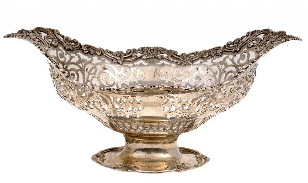 Appraisal: AN EDWARD VII PIERCED FRUIT BASKET with applied openwork border