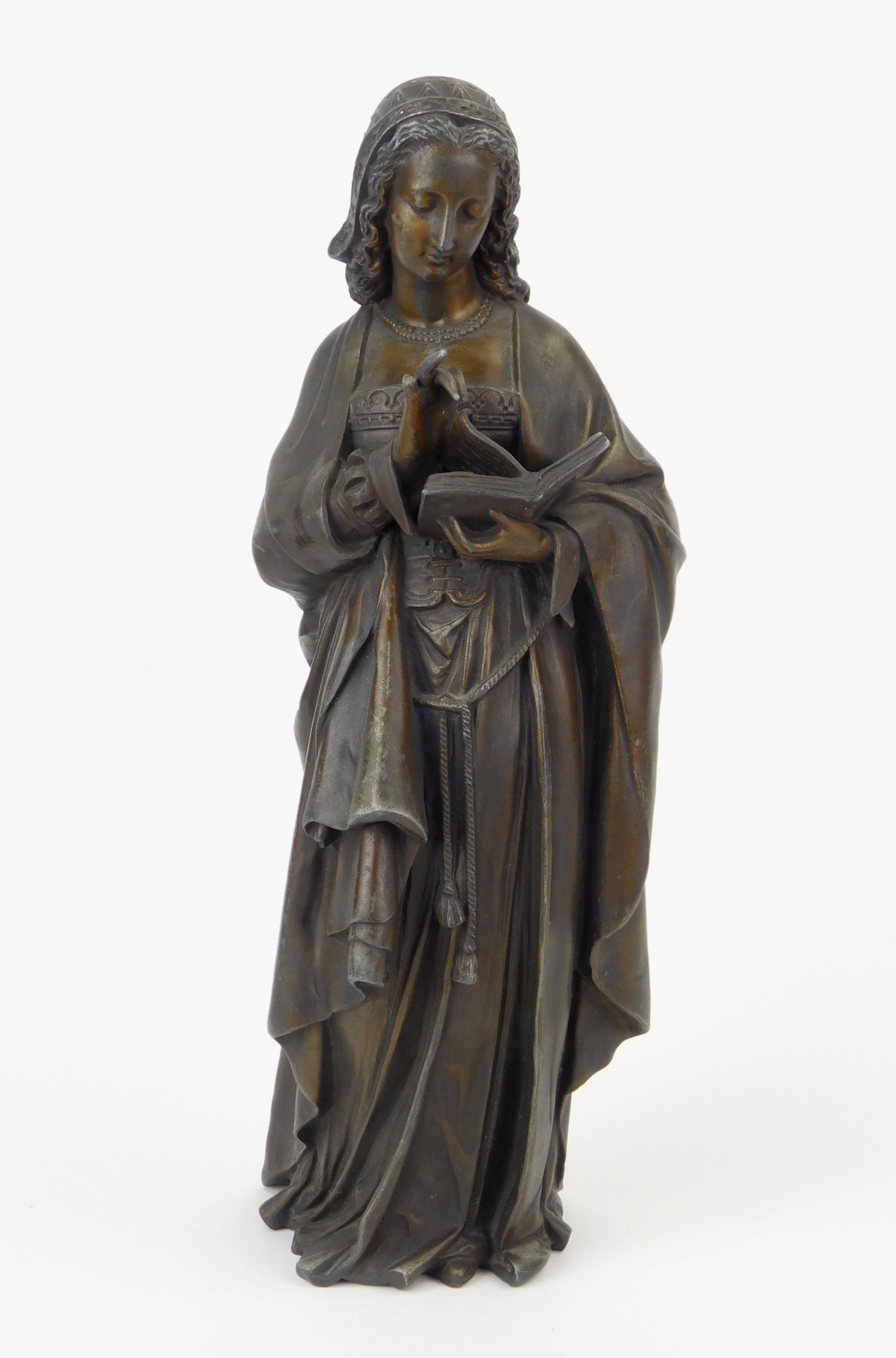 Appraisal: th c White metal sculpture of a medieval woman reading