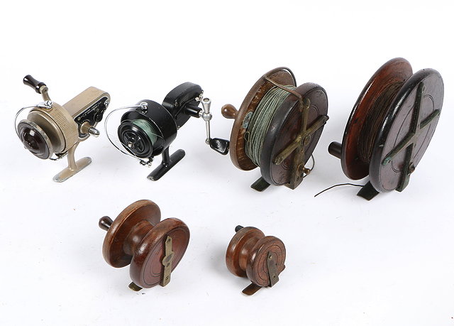 Appraisal: A MITCHEL BLACK LACQUERED FISHING REEL together with an Ambidex