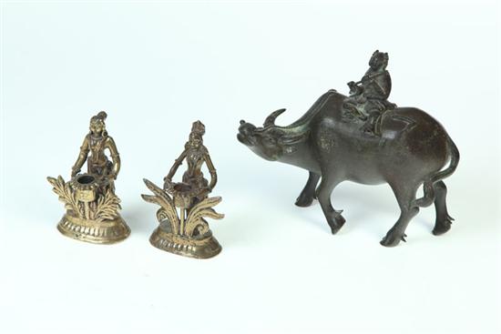 Appraisal: PAIR OF FIGURAL CANDLESTICKS AND A BULL FIGURE Asian th