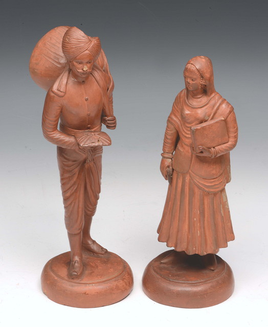 Appraisal: A PAIR OF TH CENTURY INDIAN TERRACOTTA FIGURES of a