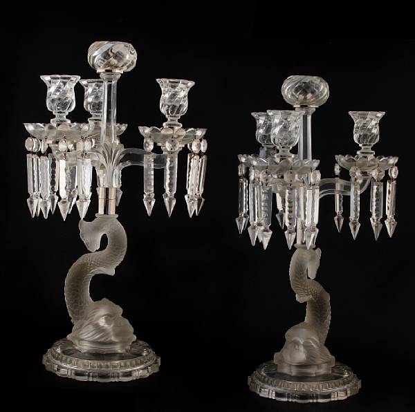 Appraisal: A pair of French pressed glass dolphin form three light